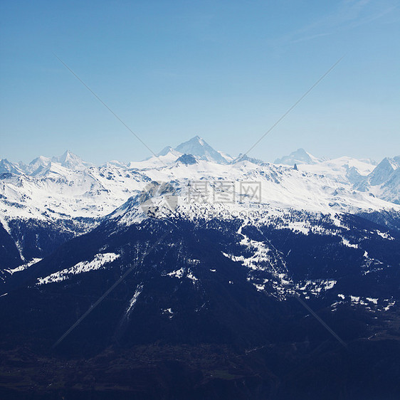 山上有高山顶峰单板滑雪太阳远足阳光旅游全景岩石季节图片