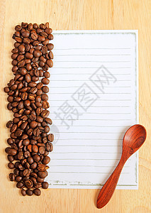 咖啡豆和勺子及纸纸在木背面纸上作笔记美食咖啡店食物海报粮食横幅菜单桌子咖啡备忘录图片