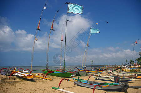 沙滩上的渔船钓鱼运输旗帜海滩旅行海洋热带风景图片