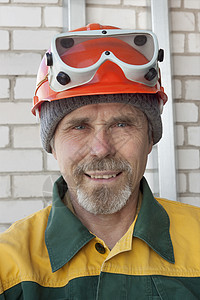 戴防护头盔的老年工人建设者男人索具男性服饰微笑快乐工作服工作联合会图片