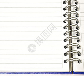 打开笔记本日历日记白色办公室木板软垫教科书戒指空白笔记图片