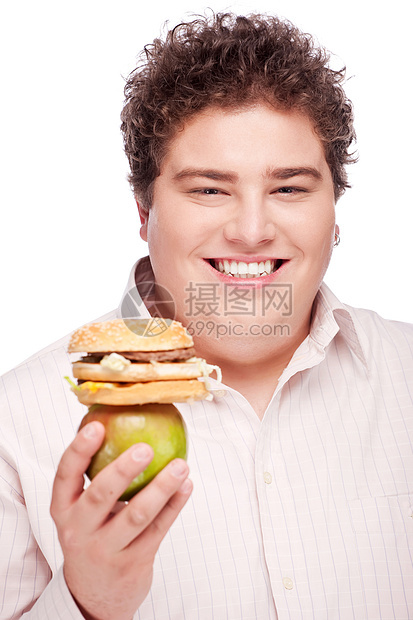 胖胖男人拿着苹果和汉堡包水果午餐脂肪面包热量饥饿美食晚餐重量食欲图片