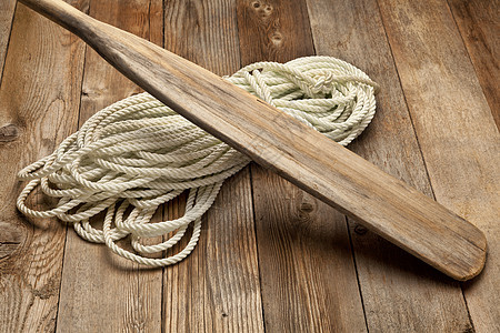 旧桨和绳圈背景图片