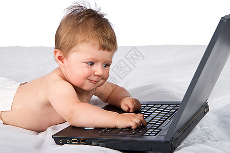儿童玩笔记本电脑女孩黑色技术孩子餐巾学习男生微笑白色游戏图片