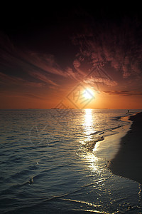 日落在海中阳光橙子海洋地平线假期旅行反射海浪金子热带图片