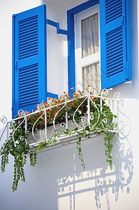 蓝色旧时窗口玻璃花园风景框架商业窗户文化建筑家具艺术图片