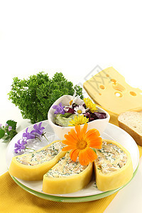 奶酪卷小吃盘子韭菜餐厅黄色脑袋派对草药绿色厨房图片