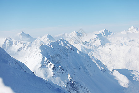 平面顶部全景远足阳光爬坡暴风雪滑雪蓝色天空冰川太阳背景图片