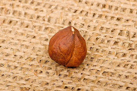 圆滑背景的黑桃栗子坚果味道宏观白色季节性榛子核桃食物小吃种子图片