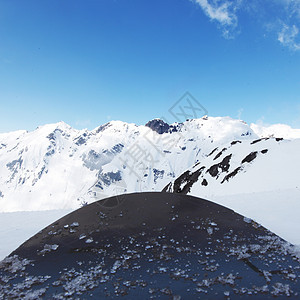 山上雪花冻结活动旅行季节冰川风景阳光爬坡山脉旅游图片