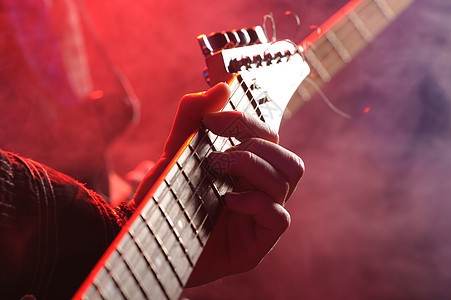 吉他玩家黑色音乐人类乐器流行音乐家舞台吉他手乐队摇滚乐摇滚背景图片
