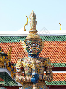 泰国曼谷大宫的泰国恶魔Thai demon奢华异国情调建筑学精神金子佛塔佛教徒文化游客图片