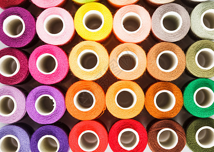 缝缝底背景缝纫爱好纤维针线活彩虹织物衣服光谱纺织品绳索图片