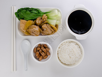 有大米和蔬菜背景的鸡肉饮食猪肉沙锅萝卜蒸汽土豆盘子烹饪格子草本植物图片