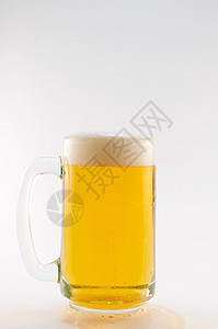 啤酒杯泡沫酒吧宏观飞沫酿造金子饮料气泡口渴啤酒图片
