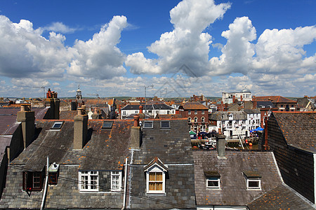 英格兰海滨小屋英语建筑学阳台旅行植物晴天绿色住房天空屋顶图片