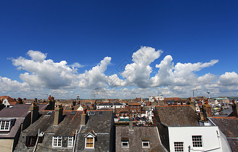 英格兰海滨小屋蓝色晴天旅行天空屋顶植物建筑英语建筑学阳台图片