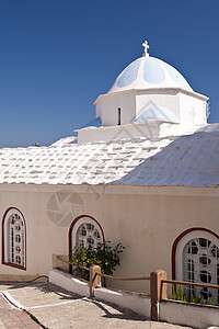 萨莫斯东正教宗教旅行城市蓝色圆顶白色教会海岸回廊建筑图片