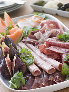 阿费塔蒂米斯蒂的一盘火箭黄瓜影棚冷盘美食食物盘子猪肉小吃沙拉图片