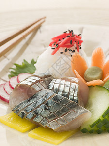 与沙拉和醋干寿司五谷杂粮谷物食品鱼类海鲜萝卜粮食鱼片盘子图片