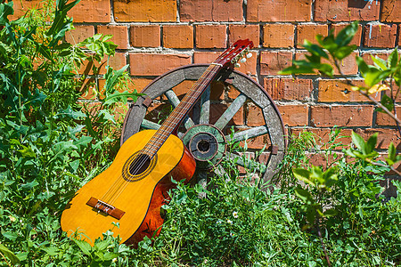 吉他和老马车轮车皮艺术民间乐器笔记细绳音乐水平国家娱乐图片