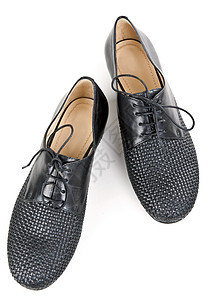 时髦的黑皮鞋鞋类配件工作室白色皮革抛光鞋带图片