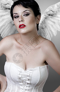 美丽的悲伤天使 带着白色的紧身衣和光翅膀 内裤图片