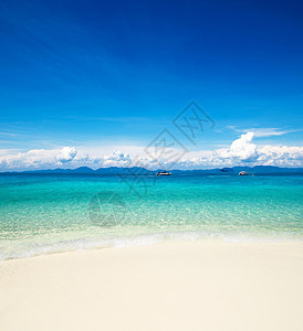 热带海洋晴天蓝色海岸天堂天空太阳支撑假期海浪海景图片