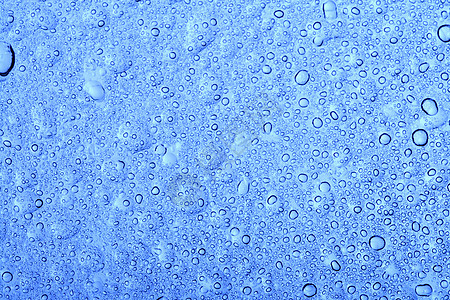 水滴天气飞沫蓝色反射气泡宏观雨水风暴玻璃淋浴图片