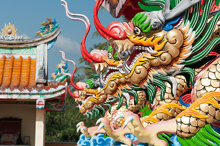 中国风格的龙雕像寺庙雕塑蓝色文化金子宗教艺术传统童话刺刀图片