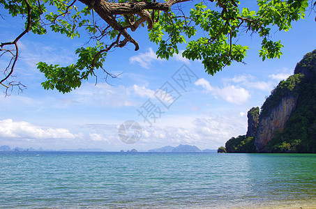 海 海海滩异国悬崖海浪海岸天堂风景天空热带太阳背景图片