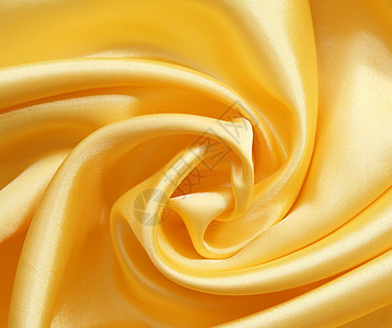 平滑优雅的金金丝绸黄色纺织品折痕海浪曲线布料材料丝绸涟漪投标图片