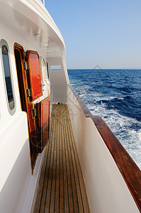 游艇牌客舱旅行海浪蓝色阳光冒险闲暇甲板气候旅游图片