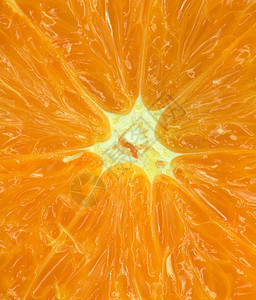 用于背景的橙色宏果汁果胶食物流感水果维生素种子叶状橘子阳光图片
