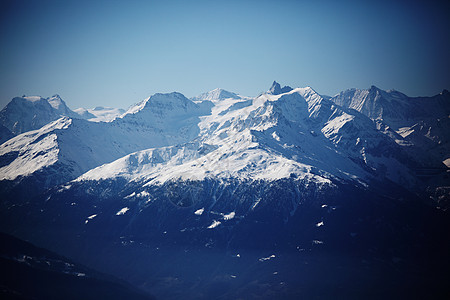 山上有高山风景全景旅游远足旅行活动季节滑雪岩石冻结图片