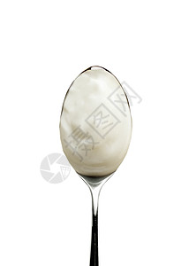 酸奶的勺子 白上孤立牛奶白色维生素奶油美食宏观奶制品烹饪敷料食物图片