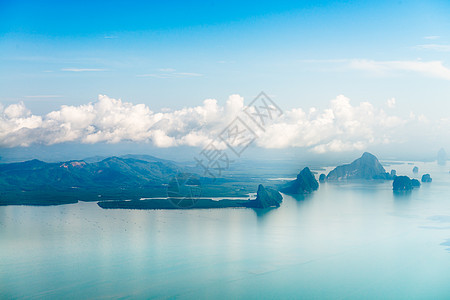 热带岛屿的空中观望娱乐冲浪悬崖情调天堂太阳石头海洋蓝色岩石图片