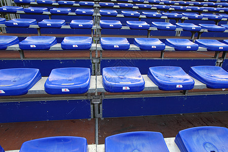 足球场许多蓝色和黄色的Vip座位数字坡道人群竞技场运动黑色民众剧场长椅微分图片