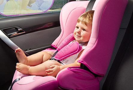 安全车座上婴儿的安全保障带子生活幸福情感喜悦手指孩子孩子们座位旅行图片