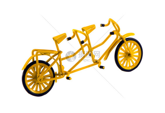 白色上隔离的双型自行车玩具装饰图片