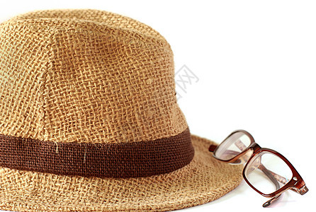 戴白底眼镜的夏季草帽花帽图片
