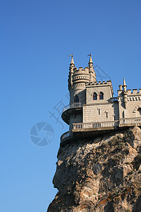 岩上城堡悬崖房子地方顶峰据点蓝色波峰动物旅行巢穴图片