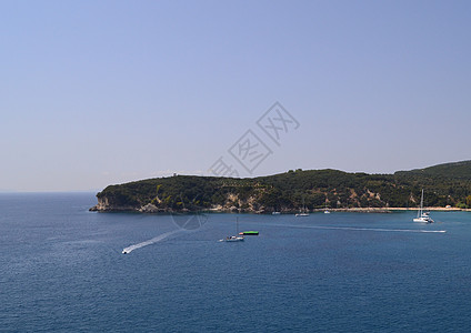 海滨海岸蓝色摄影阳光天空岩石边缘游客血管海浪爬坡图片