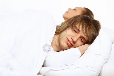年轻男子及其妻子说谎枕头女性男性苏醒家庭睡眠感情女孩男人图片