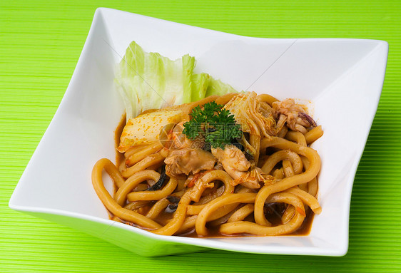 面条在背景亚西娅食物上用餐文化味道美食饥饿筷子香料餐厅午餐传统图片