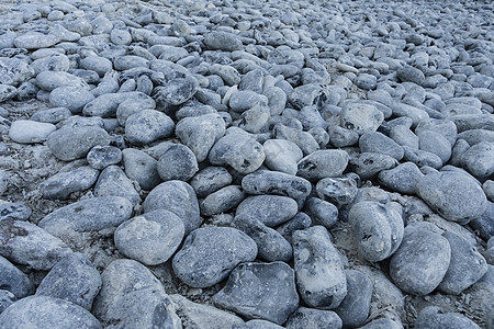 海滩上的披头士卵石岩石图片