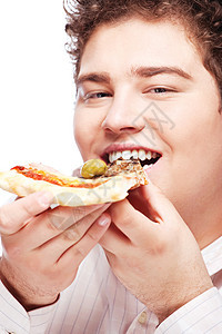 胖胖的男孩 吃一块比萨饼图片