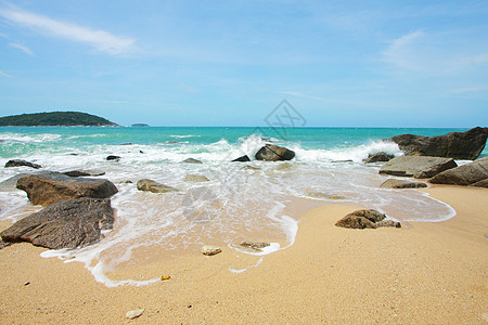 海浪在石碑上破碎力量液体碰撞阳光岩石石头曲线沿海风暴海洋图片