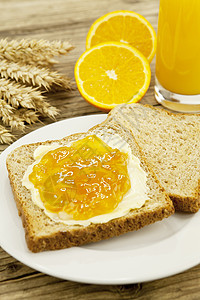 美味的早餐 吐司和蛋黄酱放在桌上饮食厨房小麦食物谷物橙子甜点桌子黄油咖啡图片