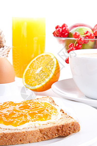 早餐桌加吐司和橘子马瓜 与世隔绝橙子甜点小麦食物饮料谷物营养木头咖啡桌子图片